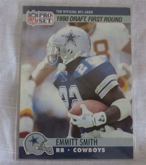 While the 1990 set of Score football was nowhere near as popular as the 1989 version, the Update set featured a very important rookie card. . Emmitt smith rookie card value
